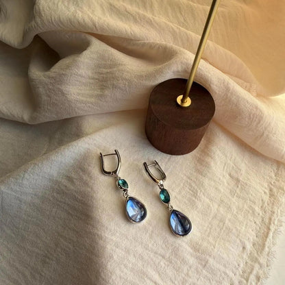 Teal & Blue Dual Crystal Drop Earrings Silver Tone — pair shown together on flat lay