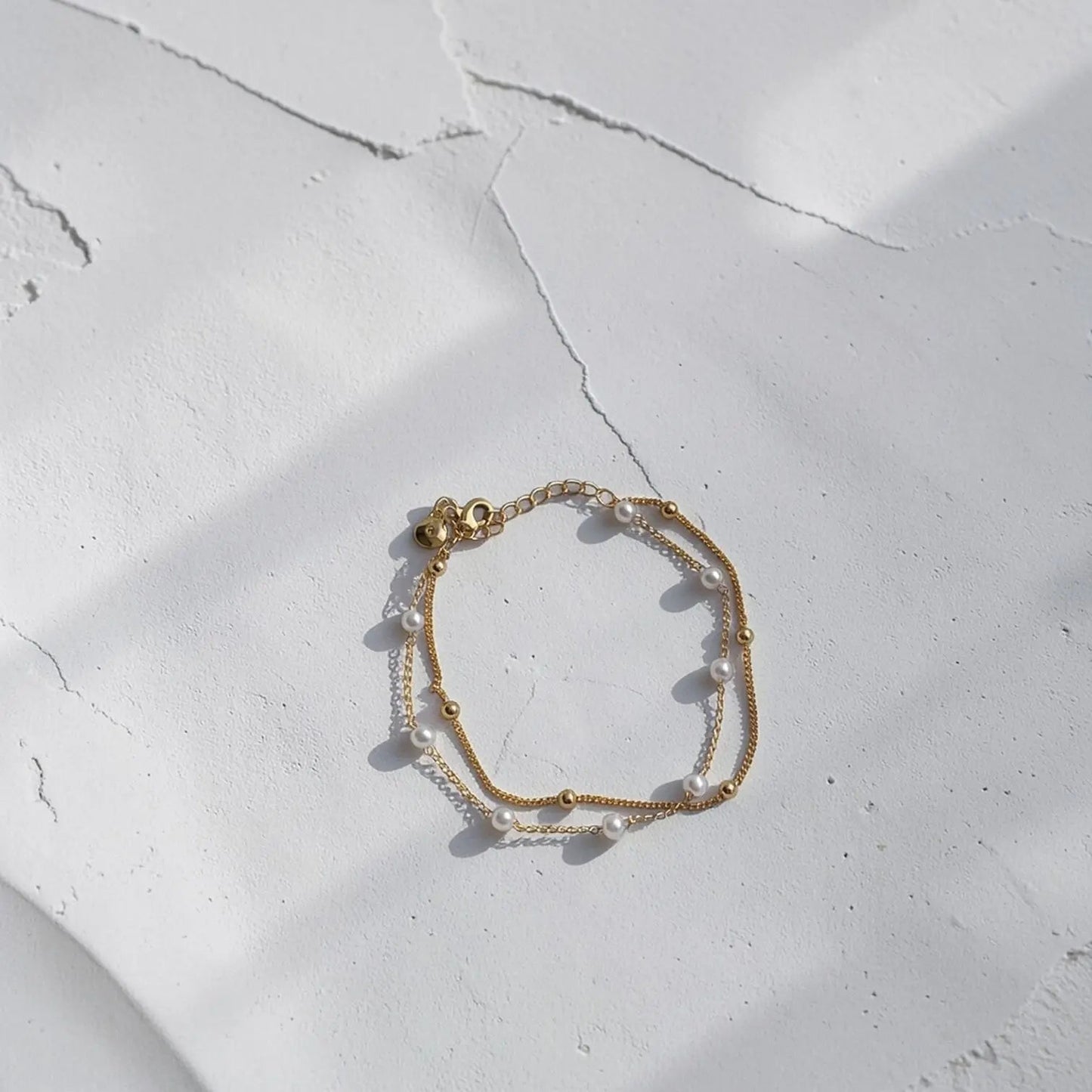 Freshwater Pearl Satin Bracelet 18K Gold Plated UK — styled layered with other bracelets