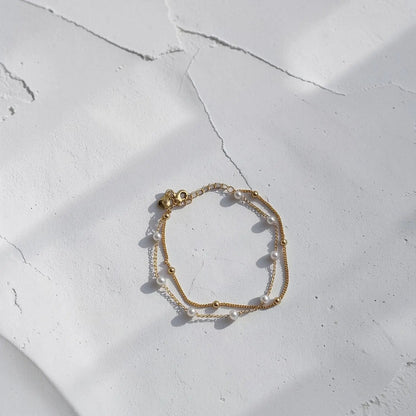 Freshwater Pearl Satin Bracelet 18K Gold Plated UK — styled layered with other bracelets