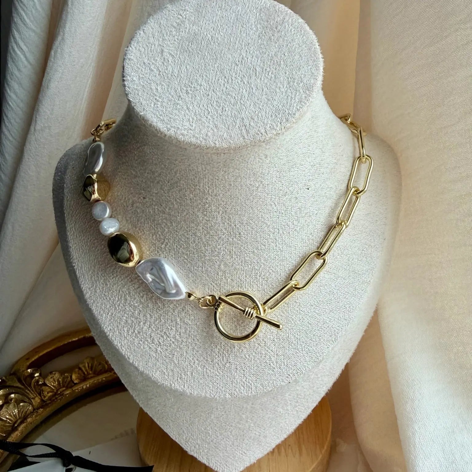 Freshwater Pearl Galaxy Pendant Necklace Gold Tone — styled flat lay with textures