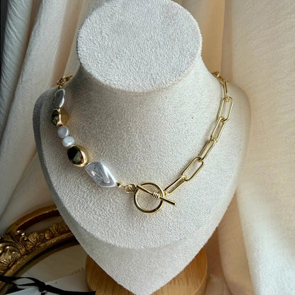Freshwater Pearl Galaxy Pendant Necklace Gold Tone — styled flat lay with textures