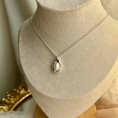 Freshwater Pearl Oval Pendant Necklace Silver Tone — detail of freshwater pearl