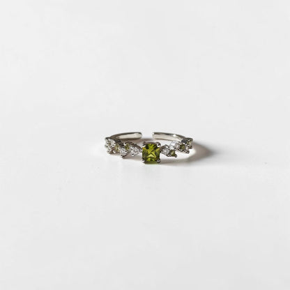 Olive Green Stone Crystal Cluster Ring Silver Open — styled flat lay