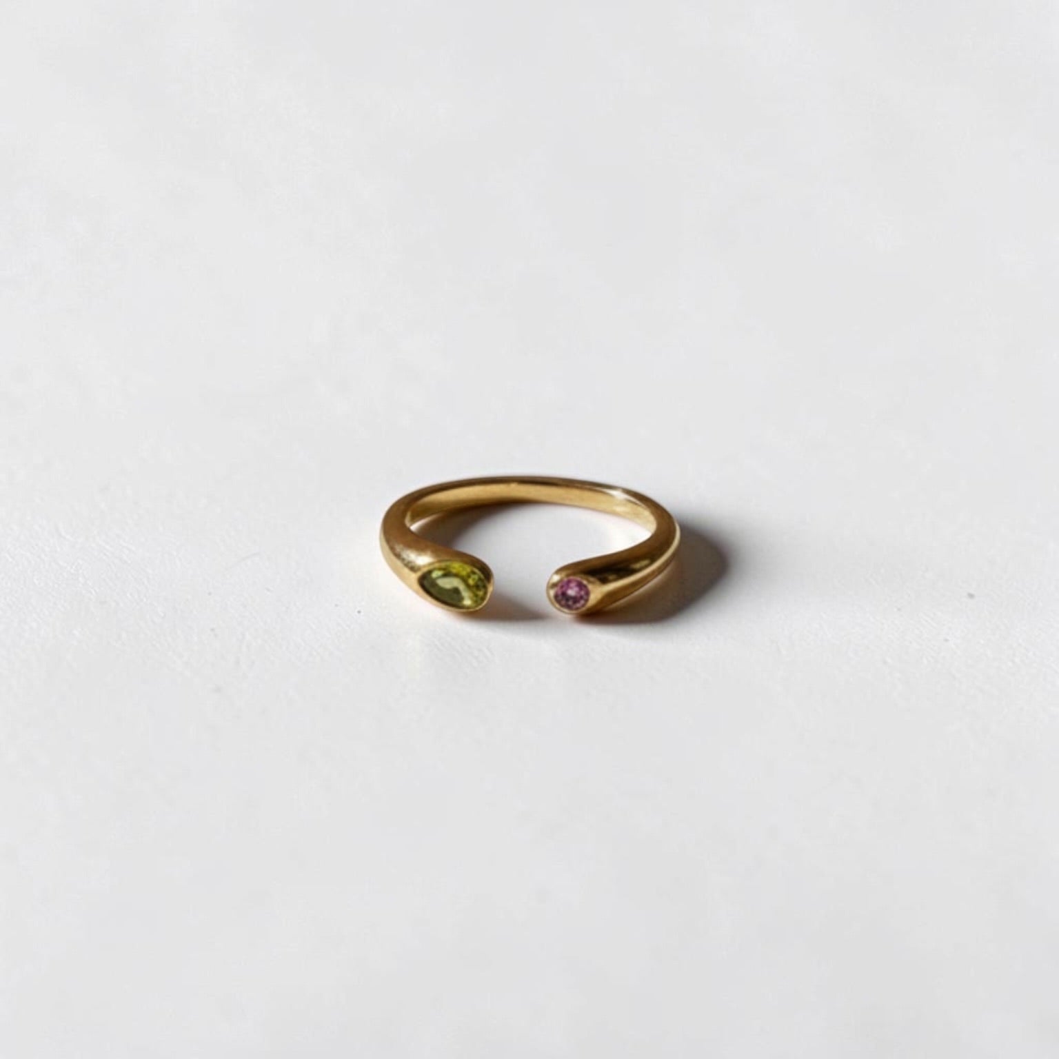 Teardrop Toi et Moi Open Ring 18K Gold Green Purple — styled flat lay