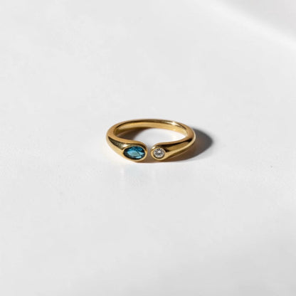 Dual Stone Toi et Moi Open Ring 18K Gold Blue Clear — styled flat lay